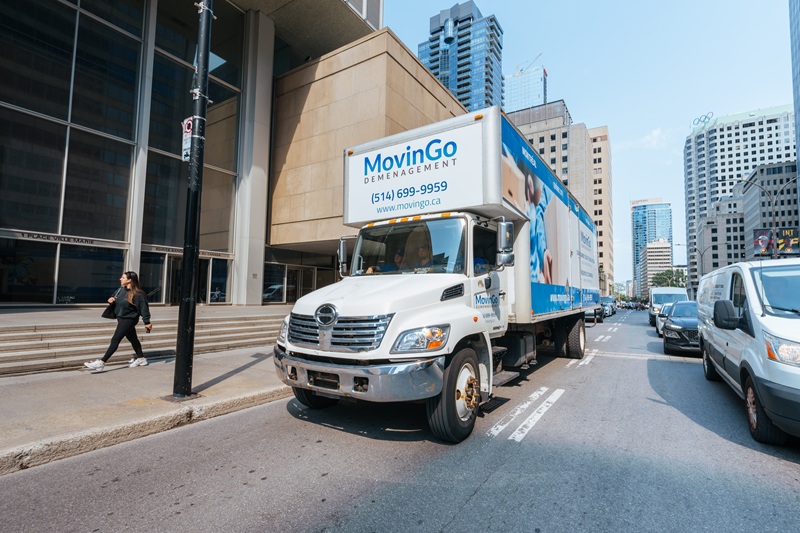 MovinGo moving truck serving a downtown Montreal office move