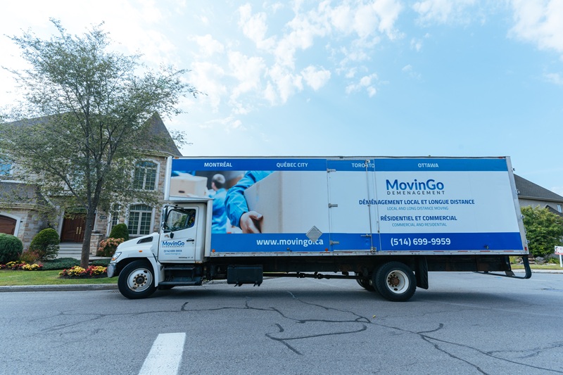 MovinGo moving truck parked during a residential move near Montreal