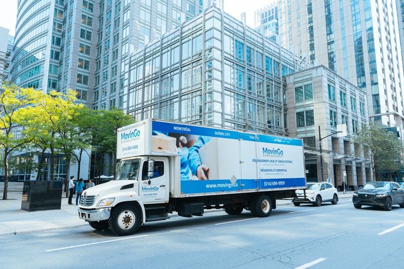 MovinGo commercial moving truck in downtown Montreal